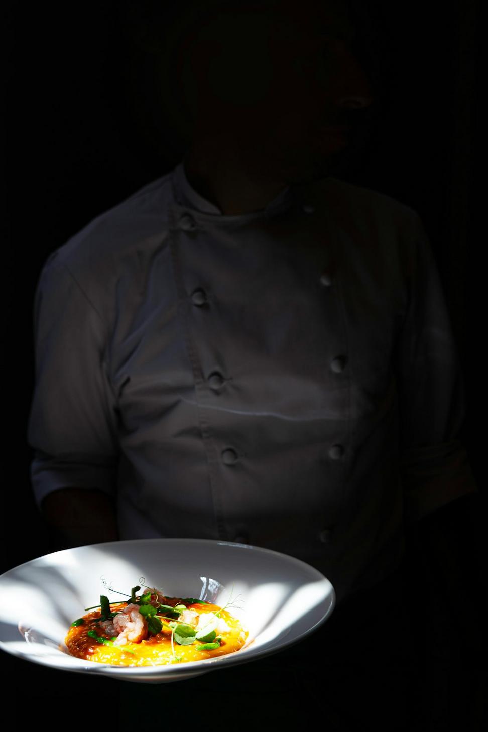 Chef preparing dish